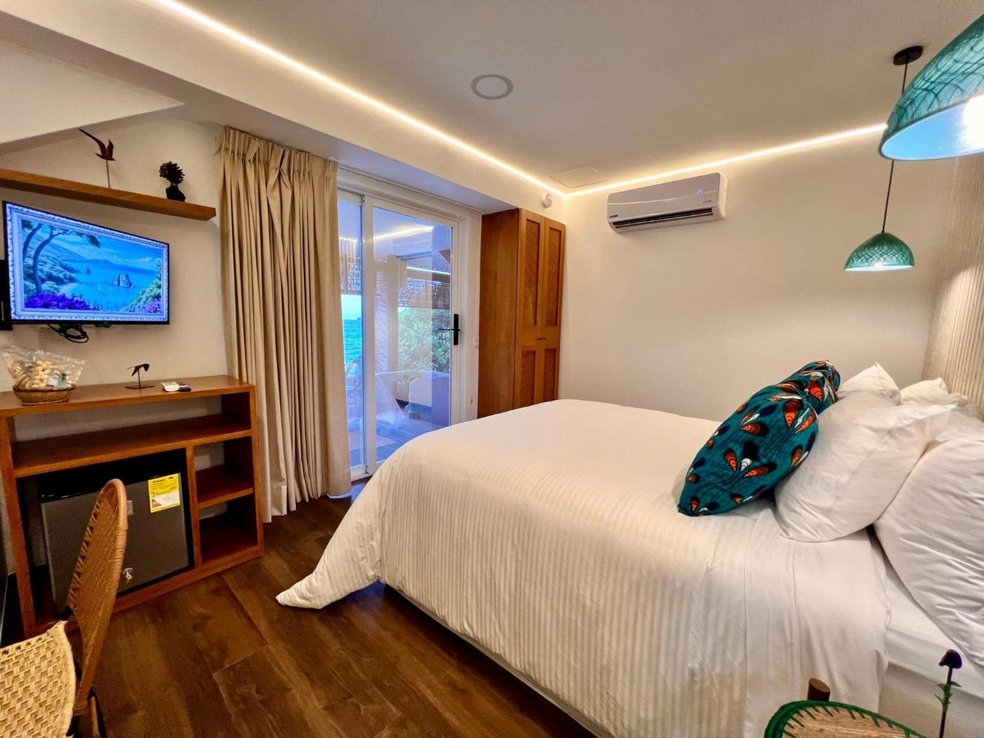 Pao Pao Hotel & Beach Club 格兰德岛 外观 照片